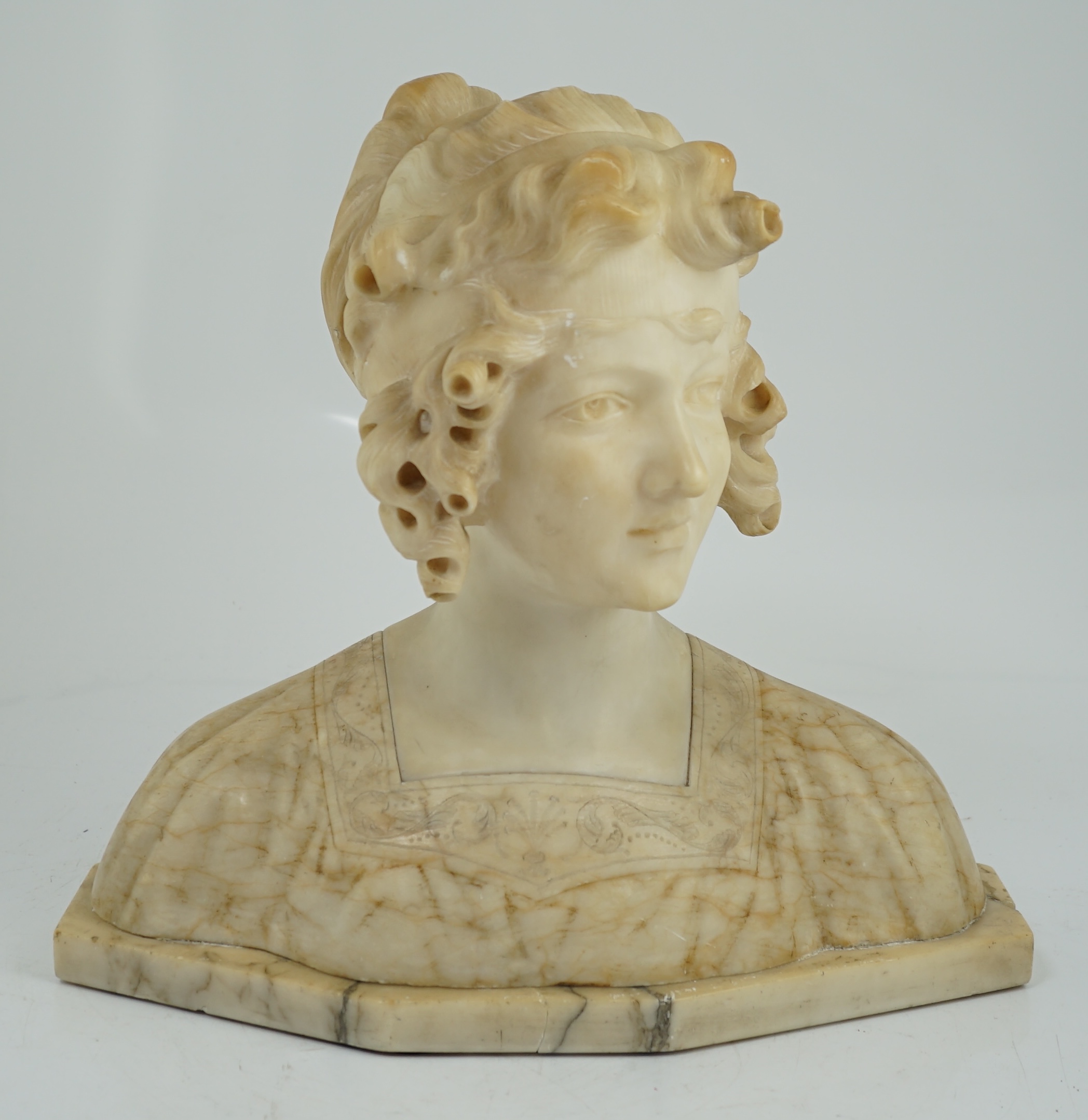 Magison Bland, an Art Nouveau alabaster head and shoulder study of a young beauty, 39cm wide, 36cm high